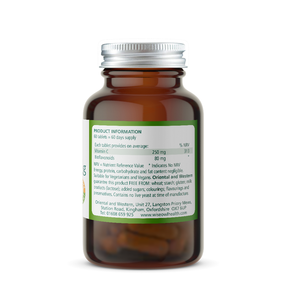 Brown supplement bottle with a green label on a white background