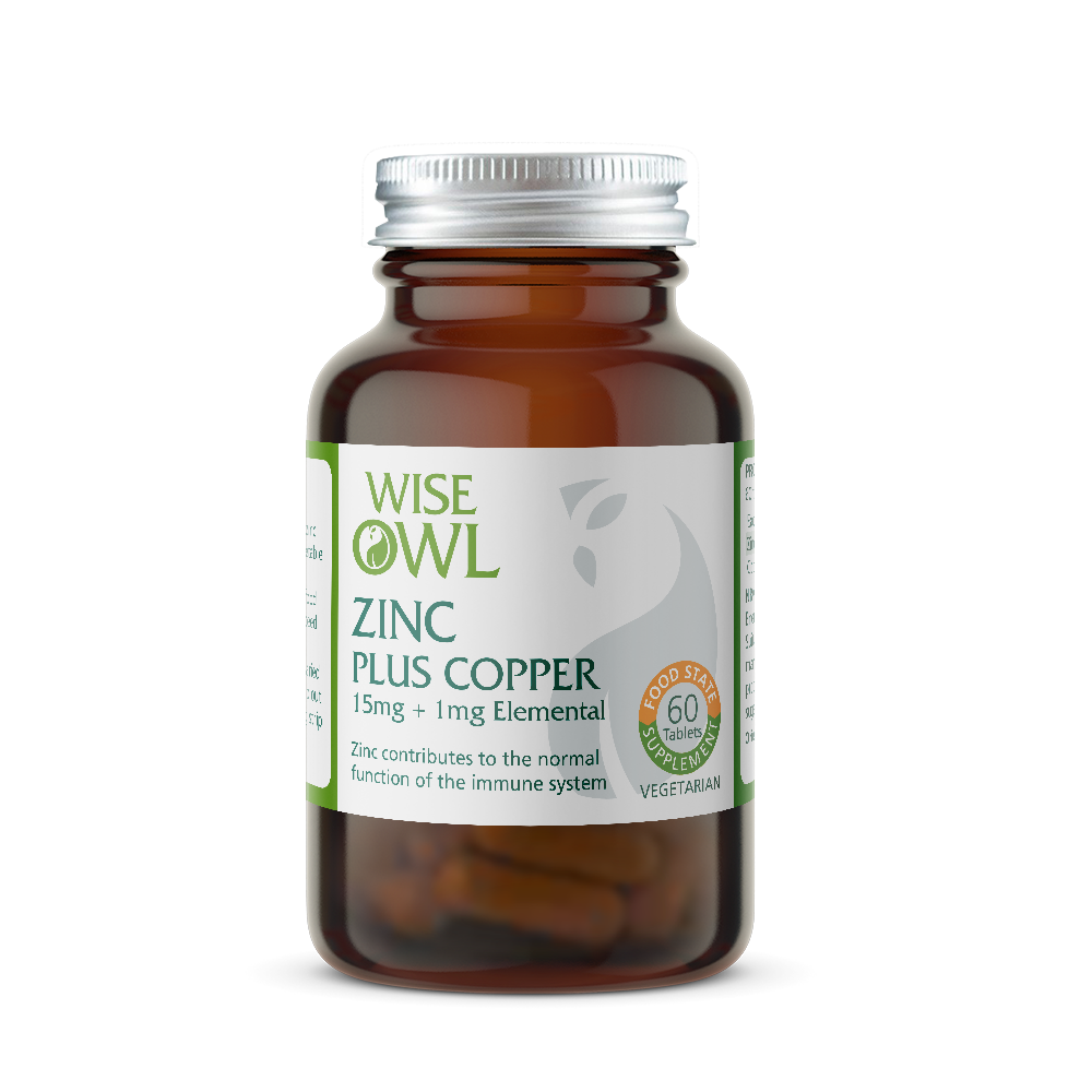 Amber supplement bottle labeled 'Wise Owl' with 'Zinc Plus Copper' on a white background
