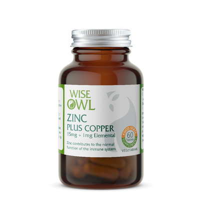 Amber supplement bottle labeled 'Wise Owl' with 'Zinc Plus Copper' on a white background