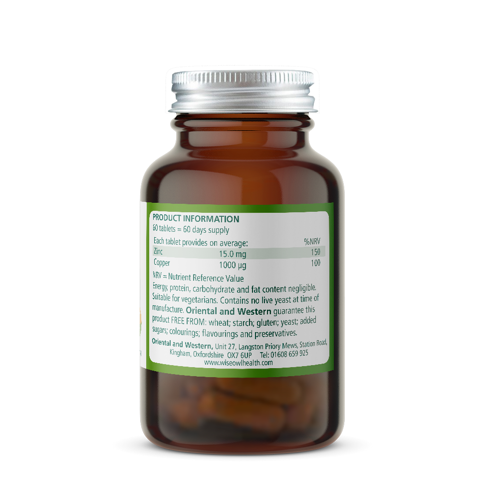 Brown Wise Owl Health Zinc Copper supplement bottle with a green product ingredients label on a white background