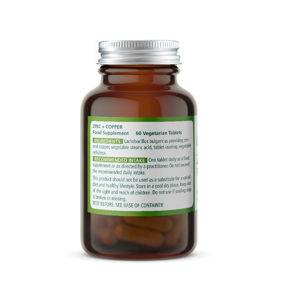 Amber glass Wise Owl Health Zinc Copper supplement bottle with a green Ingredients and Intake label on a white background