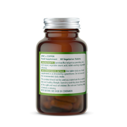 Amber glass Wise Owl Health Zinc Copper supplement bottle with a green Ingredients and Intake label on a white background